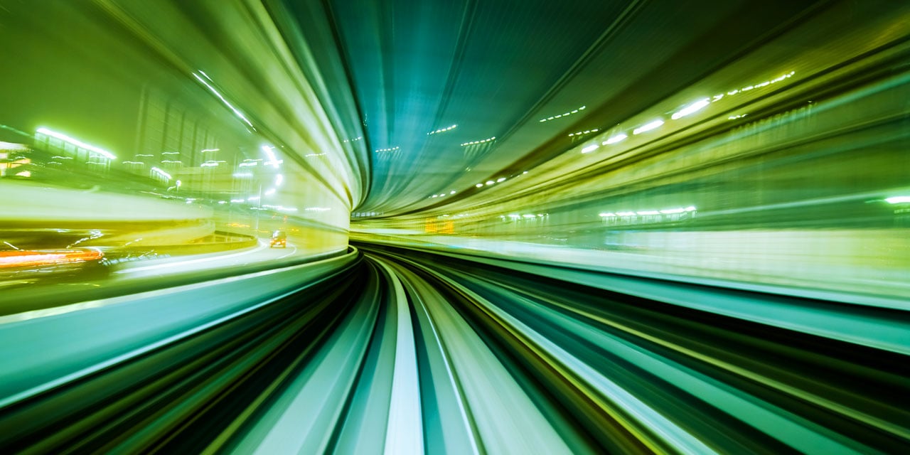 Abstract Image - Green and blue blurred image of moving cars.