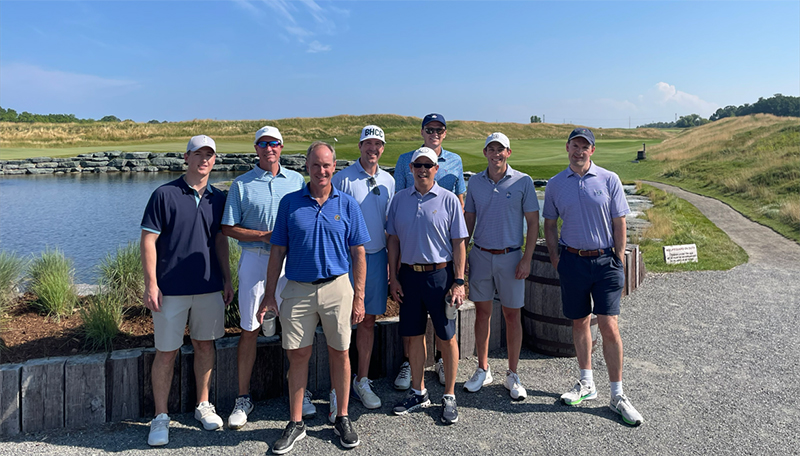 Baird Capital associate and clients golfing at Kohler golf course.